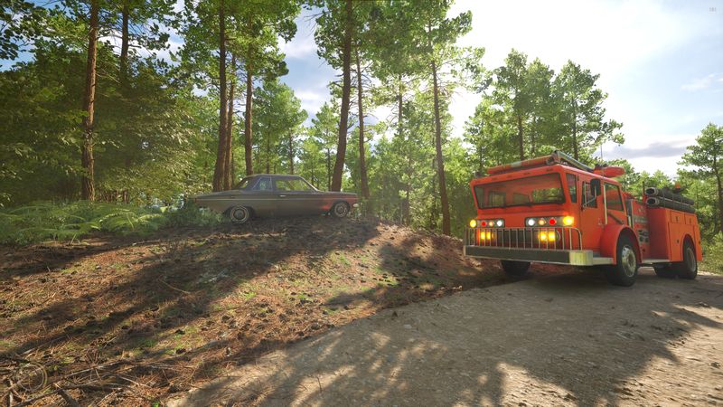 In-game screenshot — fire truck on a forest trail next to a wrecked car